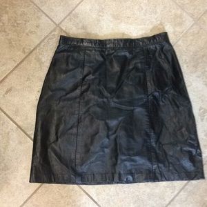 Mini black leather skirt